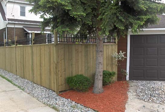 Wood fence iron lattice, Windsor Ontario